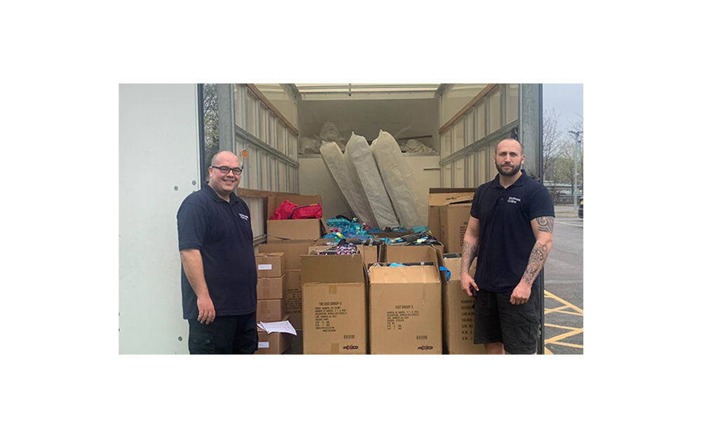 Mattress Online staff preparing Christmas hamper donations ready to be delivered for Zarach